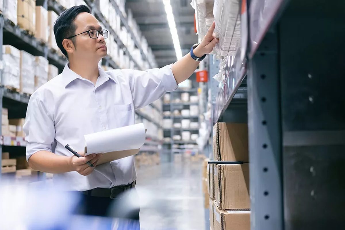 Warehouse worker checking goods